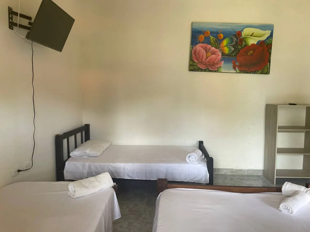 Habitación para grupos grandes con camas dobles y sencillas
